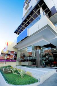 a building with a book store in front of it at D'Kalpa Hotel Demangan Yogyakarta in Yogyakarta