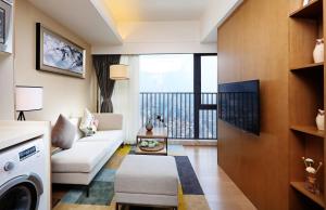 TV a/nebo společenská místnost v ubytování Yuwa Serviced Residence