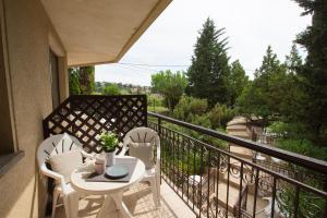 A balcony or terrace at HELIOS Hotel Apartments