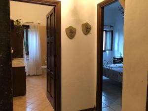 Llit o llits en una habitació de B&B A due passi dal Castello