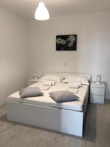 Postel nebo postele na pokoji v ubytování Nelany