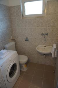 Kúpeľňa v ubytovaní Apartment Corto