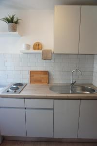 Kuchyňa alebo kuchynka v ubytovaní Apartment Corto