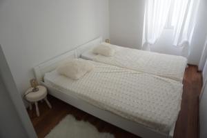 Posteľ alebo postele v izbe v ubytovaní Apartment Corto