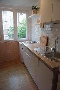Kuchyňa alebo kuchynka v ubytovaní Apartment Corto
