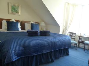 Postel nebo postele na pokoji v ubytování Burnside Guest House