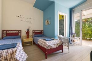 Ένα ή περισσότερα κρεβάτια σε δωμάτιο στο Villa Ariel by BarbarHouse