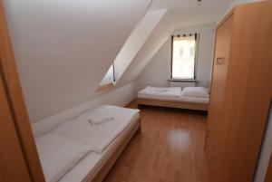 Ένα ή περισσότερα κρεβάτια σε δωμάτιο στο Apartment Stuttgart Südheim