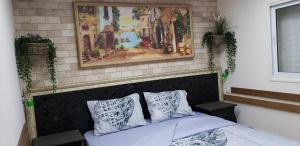 Postel nebo postele na pokoji v ubytování Shahal Apartments