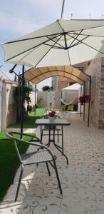 Patio nebo venkovní prostory v ubytování Shahal Apartments