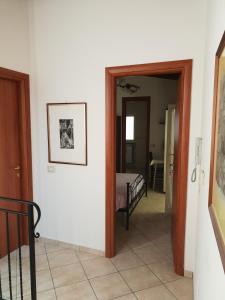 Postel nebo postele na pokoji v ubytování le tre torri