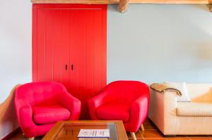 Uma área de estar em Casa Da Padeira - Turismo Rural