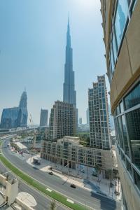 Nespecifikovaný výhled na destinaci Dubaj nebo výhled na město při pohledu z apartmánu