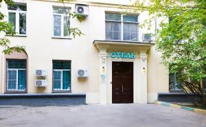 a building with a door and a sign on it at City Star in Moscow