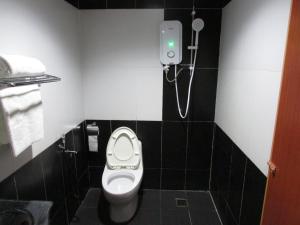 Koupelna v ubytování Safari Hotel