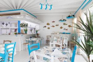 Restaurace v ubytování Palmasera Charming Suites + 30 fotografií