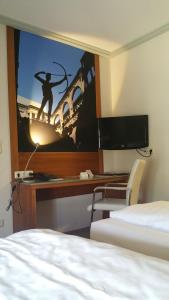 TV a/nebo společenská místnost v ubytování Hotel Cristal