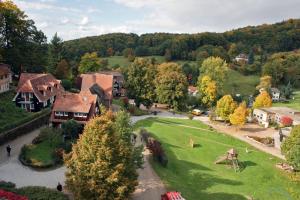 an aerial view of a village with a house and a river at Bergblick Appartement in Ober-Hambach