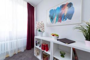 a room with a white table and a window at Bergblick Appartement in Ober-Hambach