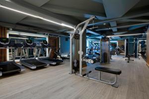 a gym with lots of treadmills and machines at The Davenport in Dublin