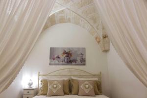 Кровать или кровати в номере Vicolo18