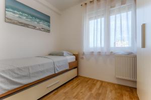 Postel nebo postele na pokoji v ubytování Two bedroom Apartment Paris