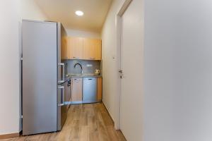 Kuchyň nebo kuchyňský kout v ubytování Two bedroom Apartment Paris