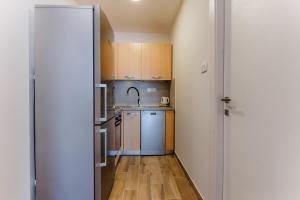 Kuchyň nebo kuchyňský kout v ubytování Two bedroom Apartment Paris