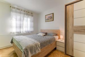 Postel nebo postele na pokoji v ubytování Two bedroom Apartment Paris