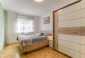 Postel nebo postele na pokoji v ubytování Two bedroom Apartment Paris