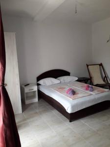 Postel nebo postele na pokoji v ubytování Apartmani Andrea-jaz