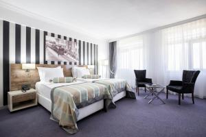 Postel nebo postele na pokoji v ubytování Ramada Hotel by Wyndham Edirne