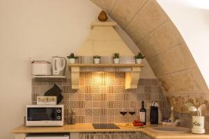 Kuchyň nebo kuchyňský kout v ubytování Vicolo18