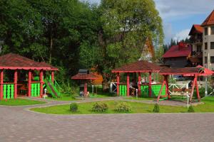 a park with a playground with a play equipment at SKI Xata in Bukovel