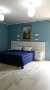 A bed or beds in a room at Villa Irena Denia