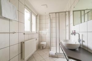 Koupelna v ubytování Hotel Villa am Waldschlösschen