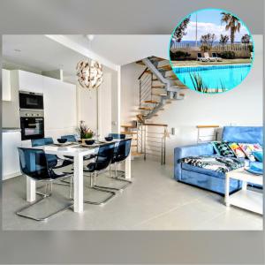 een woonkamer met een tafel en een blauwe bank bij Nuevo y acogedor duplex frente al mar in El Médano