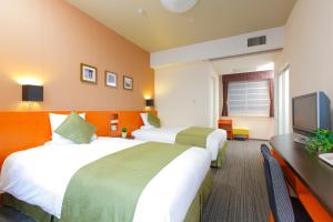 TV a/nebo společenská místnost v ubytování HOTEL MYSTAYS Kyoto Shijo