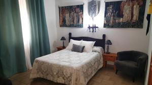 Posteľ alebo postele v izbe v ubytovaní Hotel Rural Hospedería de los Calatravos