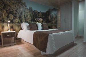 Voodi või voodid majutusasutuse HOTEl PACHAMAMA SPA toas