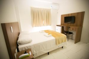 Cama ou camas em um quarto em Hotel Folley