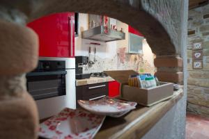 Kuchyň nebo kuchyňský kout v ubytování B&b ldl Amatrice
