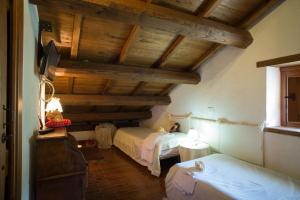 Postel nebo postele na pokoji v ubytování B&b ldl Amatrice