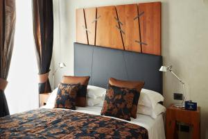 Voodi või voodid majutusasutuse The Code Hotel toas