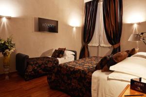 Voodi või voodid majutusasutuse The Code Hotel toas