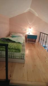 En eller flere senge i et værelse på Bolonja