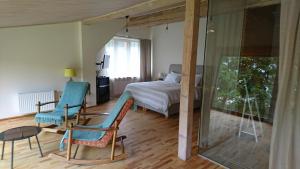 Postel nebo postele na pokoji v ubytování Guest House Vidlauči