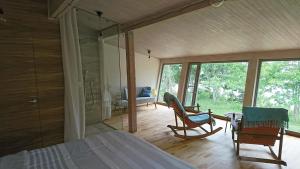 Postel nebo postele na pokoji v ubytování Guest House Vidlauči