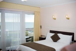 Postel nebo postele na pokoji v ubytování Pontac House Hotel + 37 fotografií