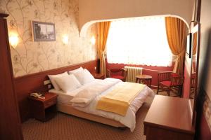 Postel nebo postele na pokoji v ubytování Saray Hotel + 33 fotografií